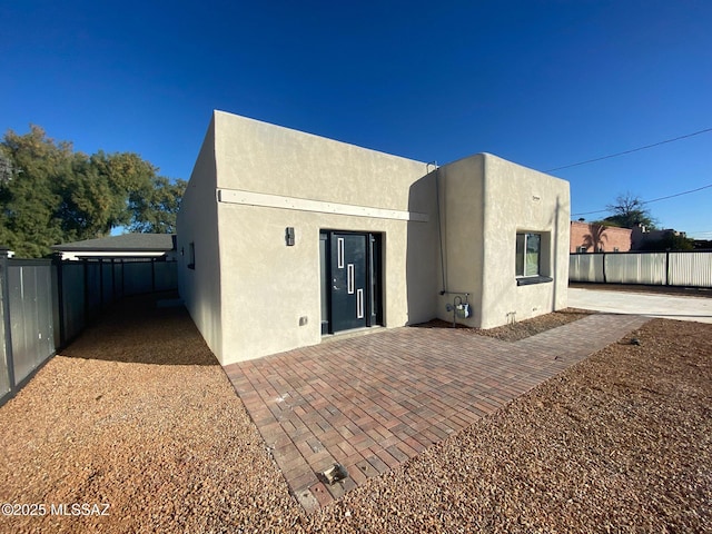 rear view of property with a patio