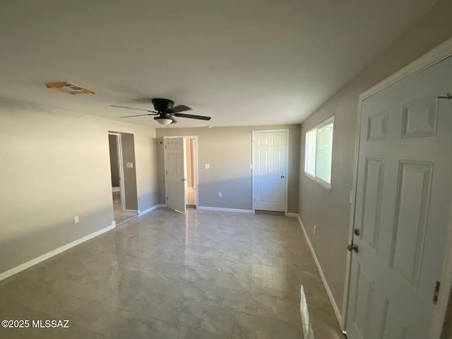 unfurnished bedroom with ceiling fan