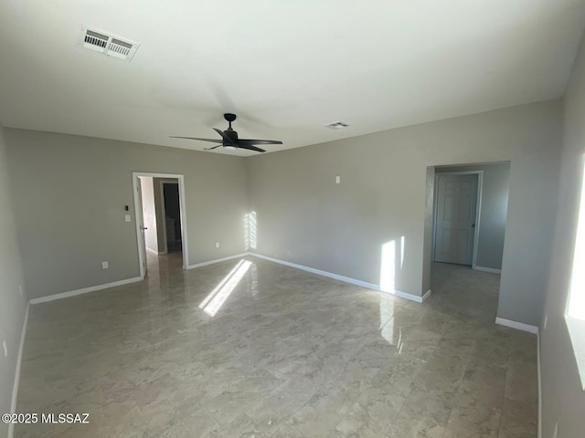 spare room featuring ceiling fan