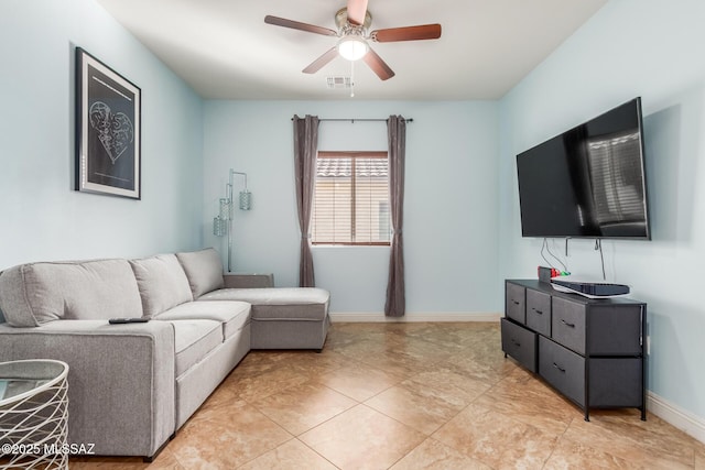 living room featuring ceiling fan