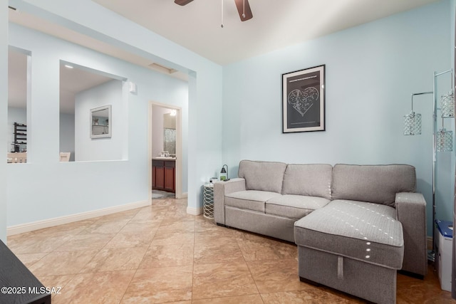 living room with ceiling fan