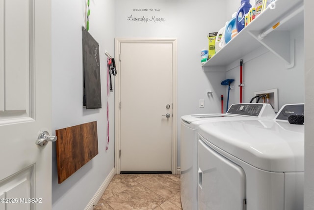 clothes washing area with washing machine and clothes dryer and light tile patterned floors