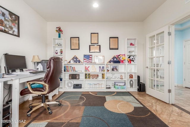 home office with built in shelves and french doors