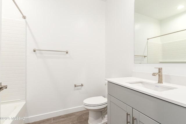 full bathroom with tub / shower combination, toilet, and vanity