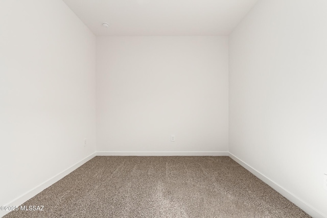 spare room featuring carpet