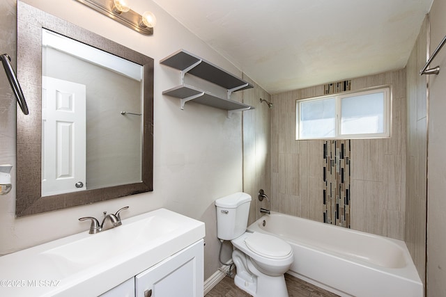 full bathroom with toilet, tiled shower / bath combo, and vanity