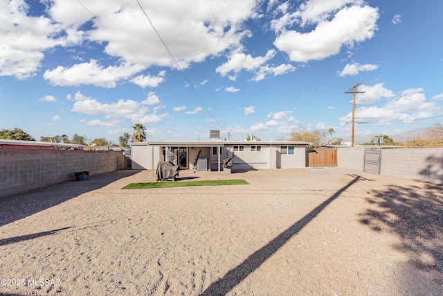 rear view of property with a patio area