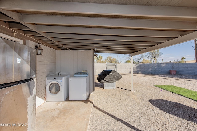 washroom featuring washer and dryer