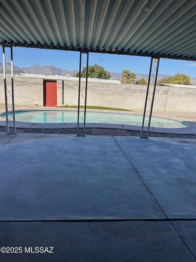 view of patio featuring a mountain view