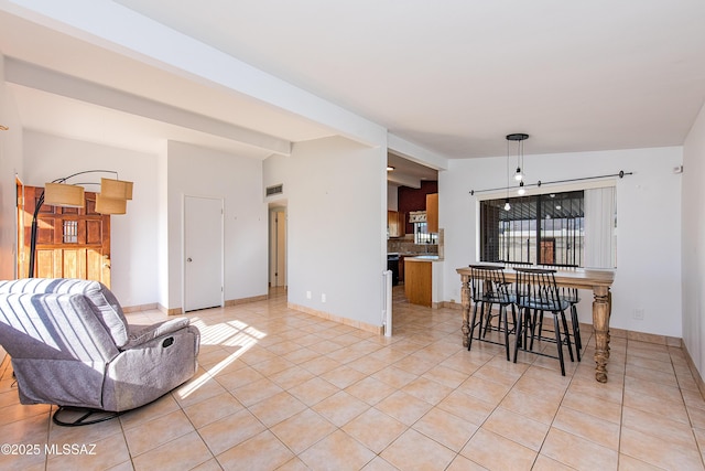 living room with light tile patterned floors