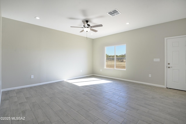 spare room featuring ceiling fan