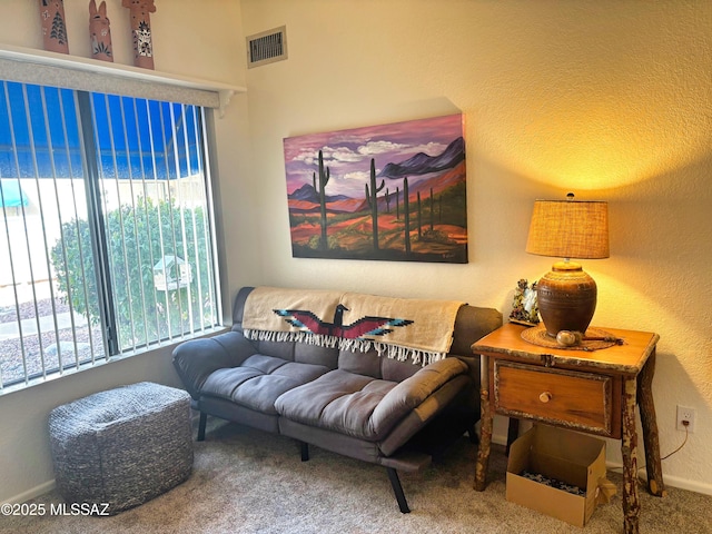 living area with carpet floors