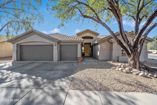 view of front of property featuring a garage