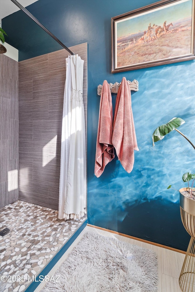 bathroom with curtained shower