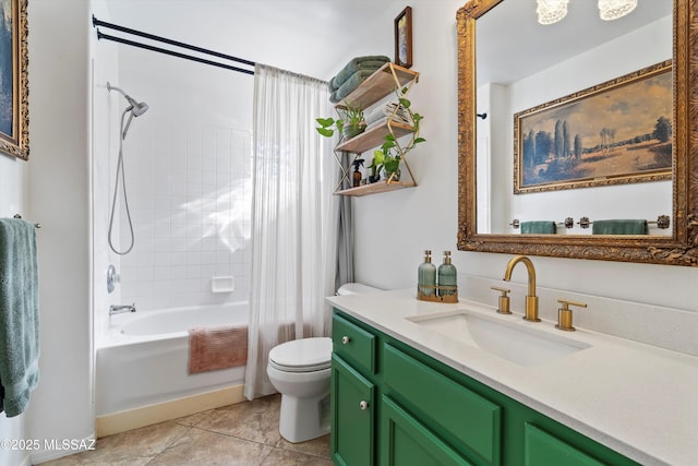 full bathroom featuring tile patterned floors, tiled shower / bath combo, vanity, and toilet