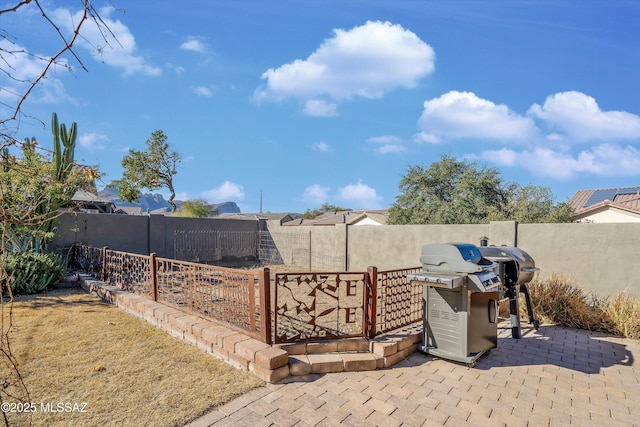 view of patio / terrace featuring a grill