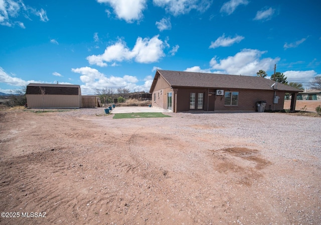 exterior space featuring a storage shed