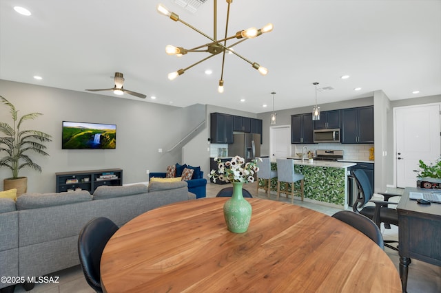 dining room with ceiling fan