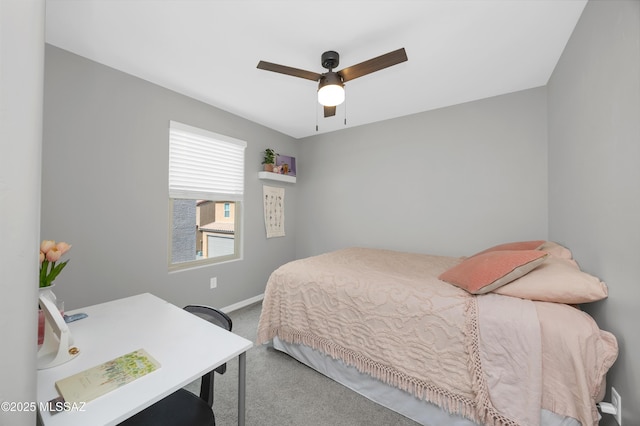 bedroom with ceiling fan and carpet