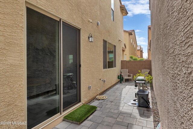 view of home's exterior with a patio area