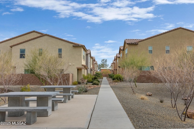 surrounding community with a patio