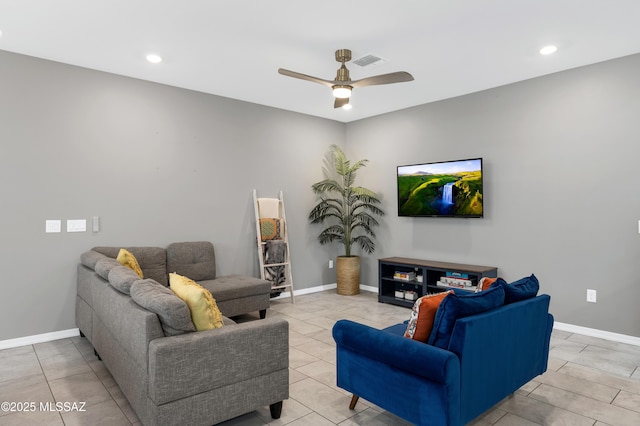 tiled living room featuring ceiling fan