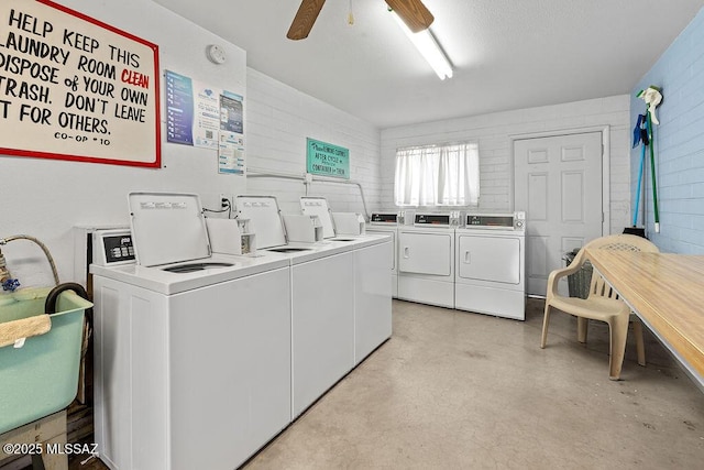 clothes washing area with washer and dryer, sink, and ceiling fan