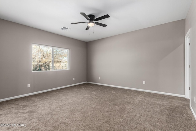 empty room with carpet floors and ceiling fan