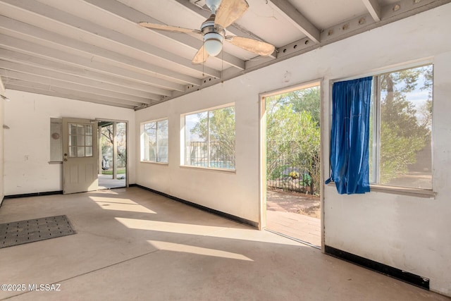 unfurnished sunroom with beamed ceiling and ceiling fan