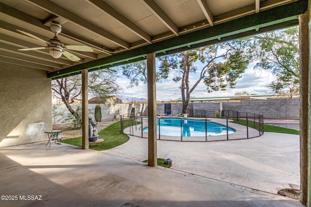 view of pool featuring ceiling fan and a patio area