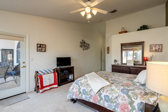 carpeted bedroom with ceiling fan and access to exterior