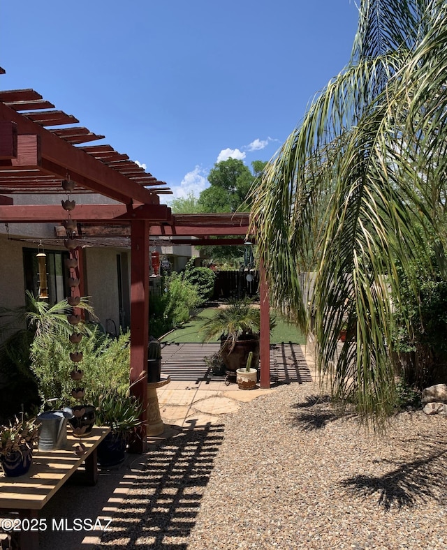 view of yard featuring a patio area and a pergola