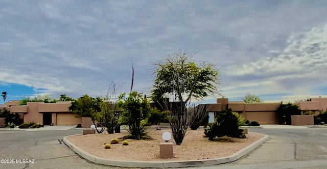 view of adobe home