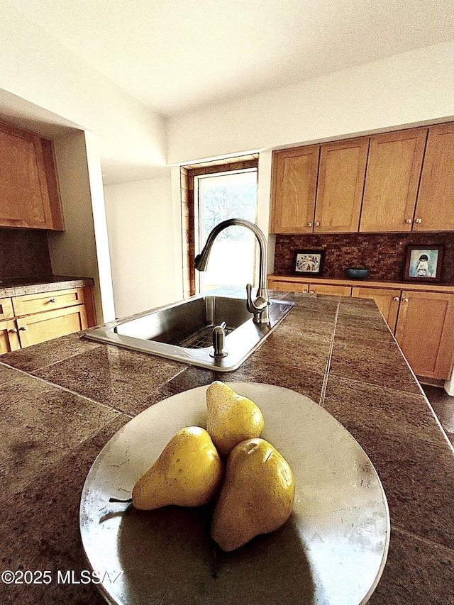 kitchen with sink and decorative backsplash