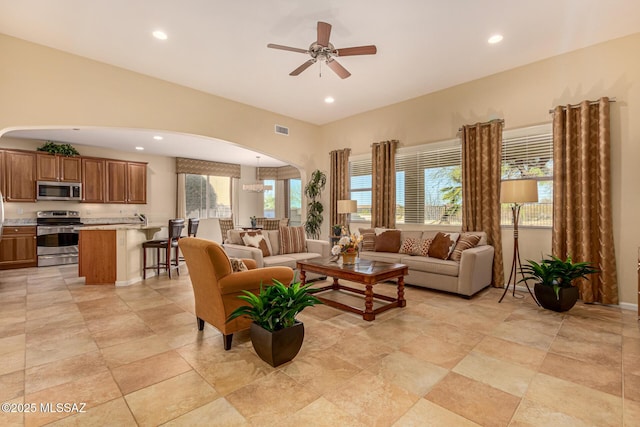 living room with ceiling fan