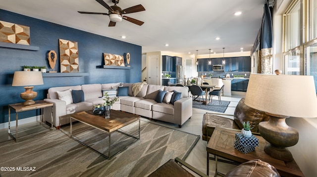 living room featuring ceiling fan