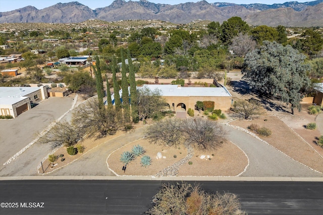 drone / aerial view featuring a mountain view