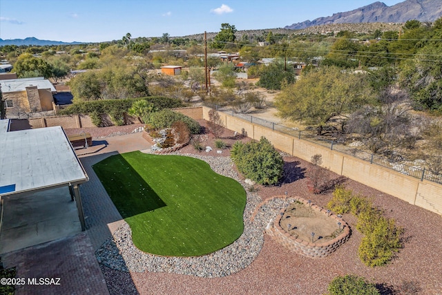 birds eye view of property featuring a mountain view