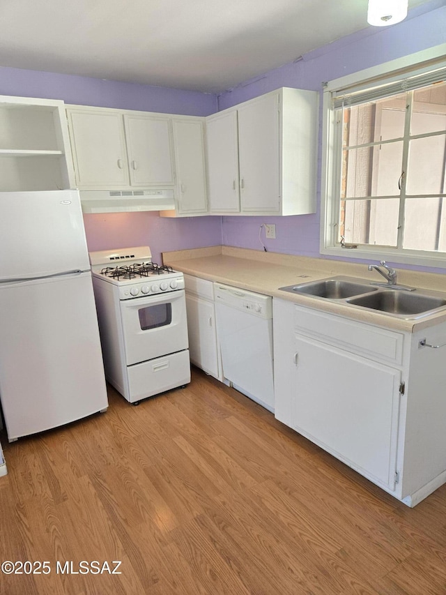 484 S La Canada Dr Unit B, Green Valley, AZ 85614 - kitchen with sink, white appliances, white cabinets, and light wood-type flooring