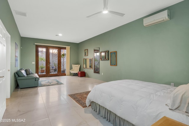 bedroom with light tile patterned flooring, ceiling fan, french doors, and a wall unit AC