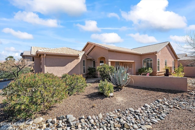 view of front of home featuring a garage