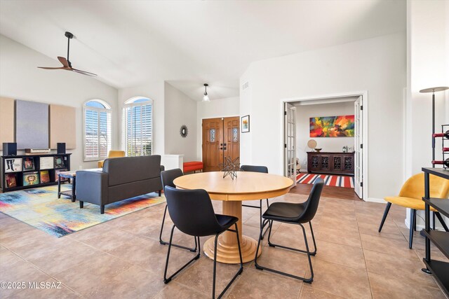 tiled living room featuring ceiling fan