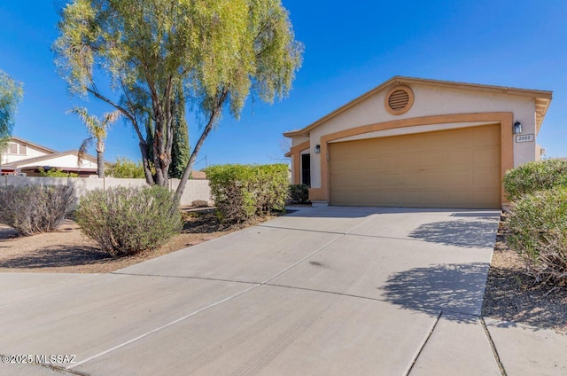 view of front of property with a garage