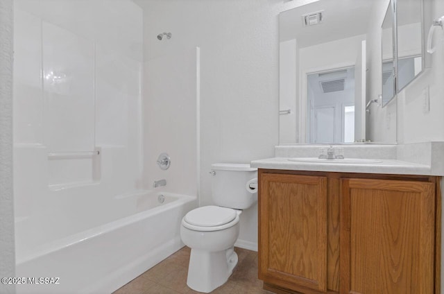 full bathroom with tile patterned floors, shower / bathing tub combination, vanity, and toilet