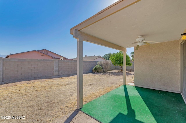 view of patio / terrace featuring ceiling fan