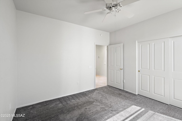 unfurnished bedroom featuring baseboards, carpet, a closet, and ceiling fan