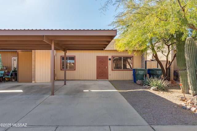 exterior space featuring a carport