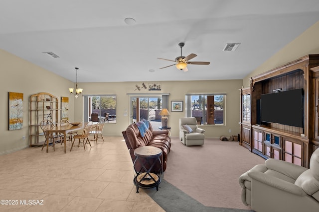 3534 E Sweet Grass Trl, Sahuarita, AZ 85629 - living room with ceiling fan, a chandelier, baseboards, light tile patterned floors, and vaulted ceiling