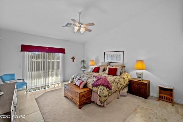 tiled bedroom featuring ceiling fan, access to exterior, and vaulted ceiling