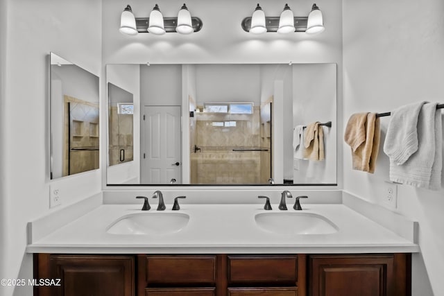 bathroom featuring walk in shower and vanity